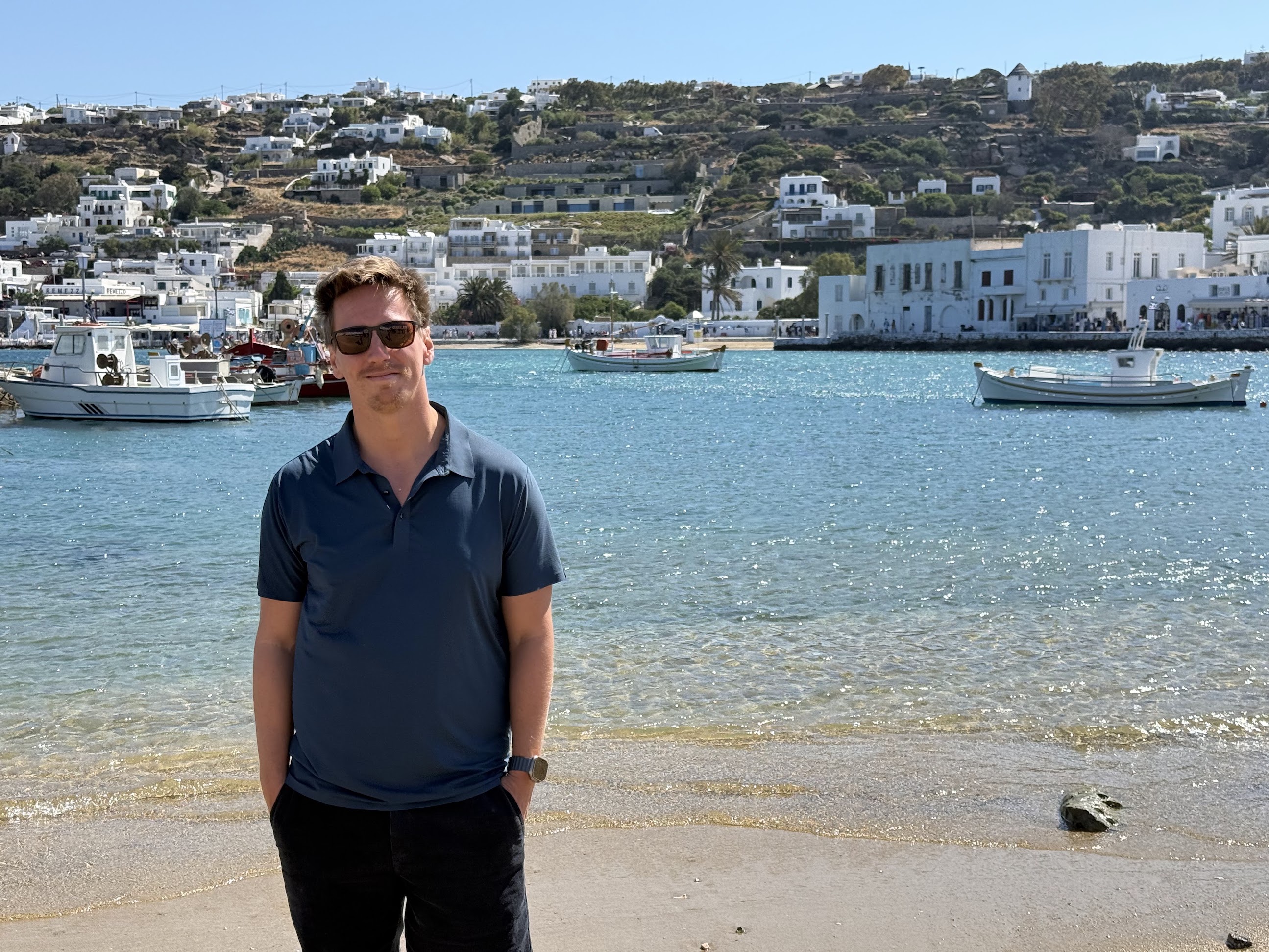 Julian Astrada by the harbor in Mykonos, Greece